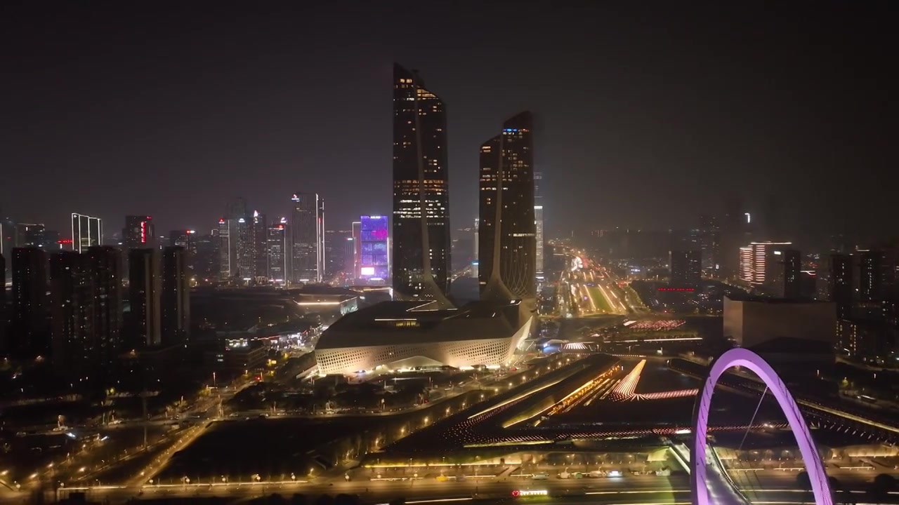 中国江苏南京保利大剧院、南京青奥中心双塔楼夜景航拍视频素材