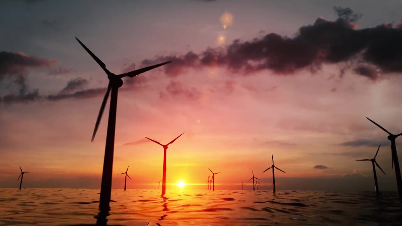风力涡轮机的剪影在海上风力发电场旋转视频素材