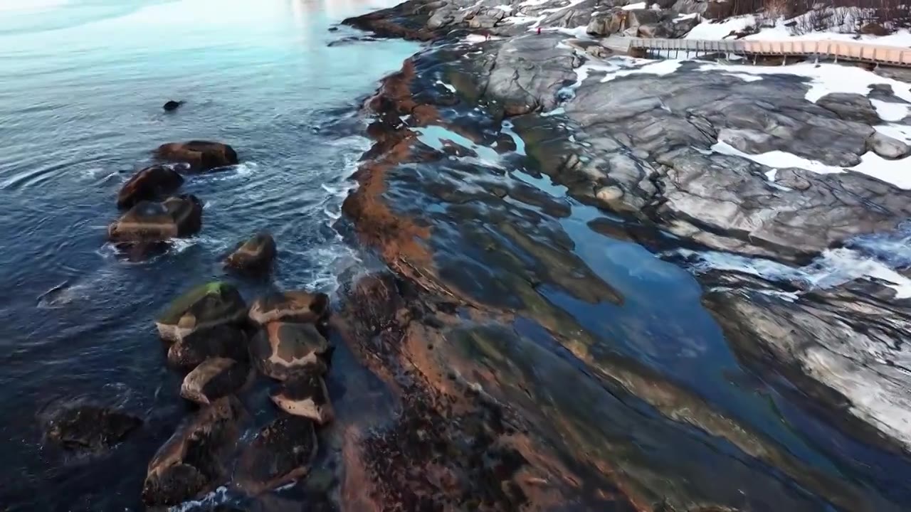 4K航拍挪威塞尼亚岛雪景最美风光视频素材