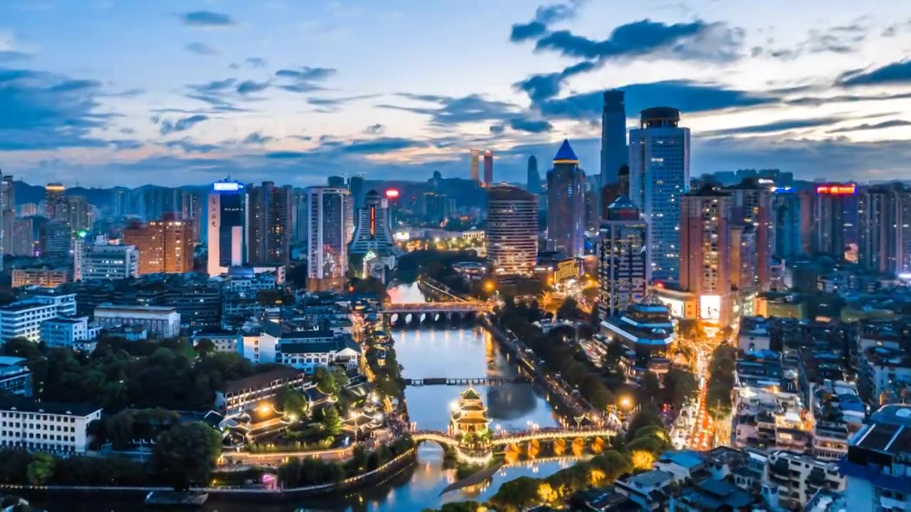 中国贵州贵阳甲秀楼和城市天际线夜景航拍环绕延时摄影视频购买