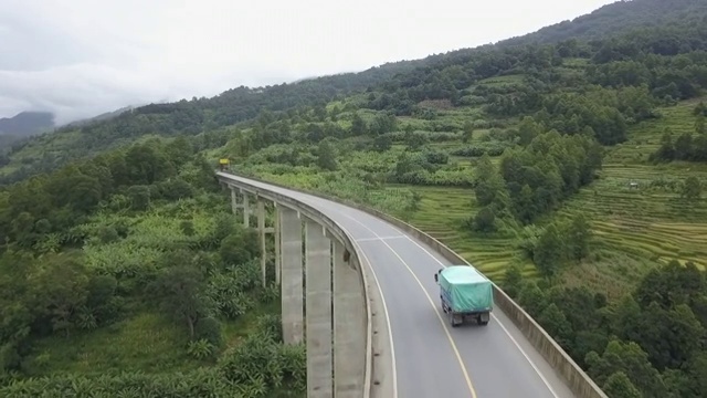 乡间公路行驶卡车航拍视频素材