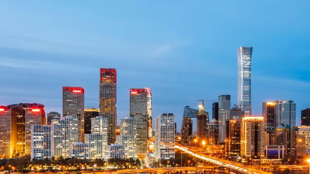 中国北京CBD建筑群特写和城市车流日转夜延时摄影视频素材