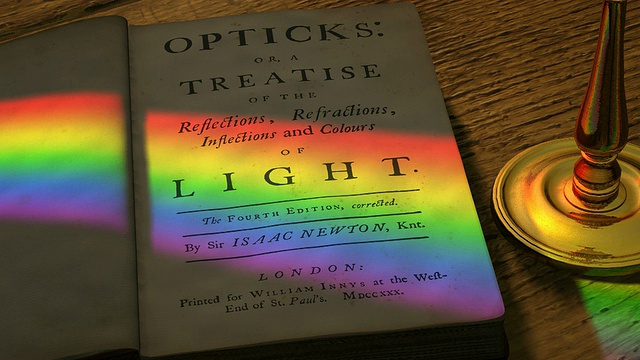 艾萨克·牛顿的《光学》的卷首图，上面的旋转棱镜投射在它上面的光谱。视频素材