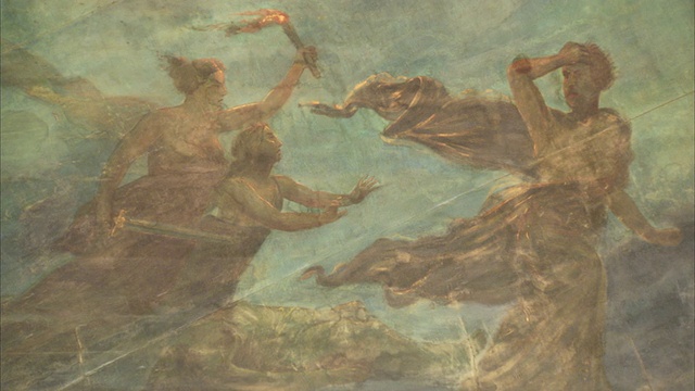 亚马逊剧院内的一幅画描绘了一名身着飘逸长袍的男子和两名女子。高清。视频下载