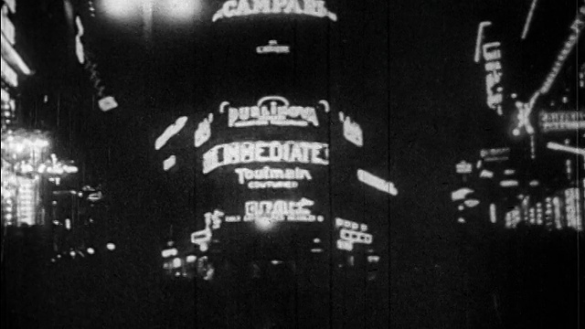 20世纪20年代夜晚城市街角的霓虹灯/法国巴黎/新闻短片视频素材