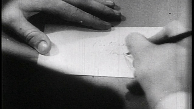 1936年秋末，在信封/纪录片上亲笔写上“邮政局长”视频素材