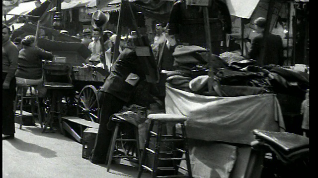 摄影车驶过街头小贩+市场/曼哈顿下东区视频素材
