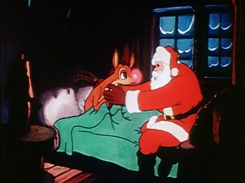 活泼的圣诞老人和红鼻子驯鹿鲁道夫从床上起来说话/声音视频素材