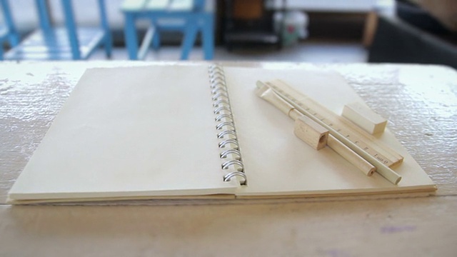 铅笔，橡皮，尺子和书与空白页，摄影视频素材