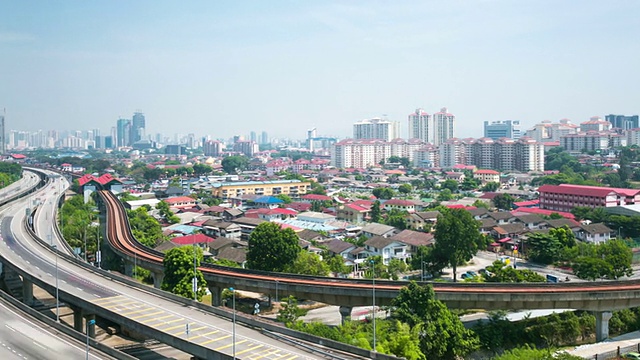 繁忙的交通，现代建筑和吉隆坡的城市景观，时光流逝。视频素材