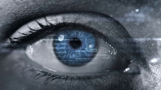 女性眼睛与程序代码。未来。技术。黑了。视频素材