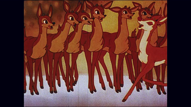 红鼻子驯鹿鲁道夫受到驯鹿界的尊敬，圣诞老人给鲁道夫颁发奖章视频素材