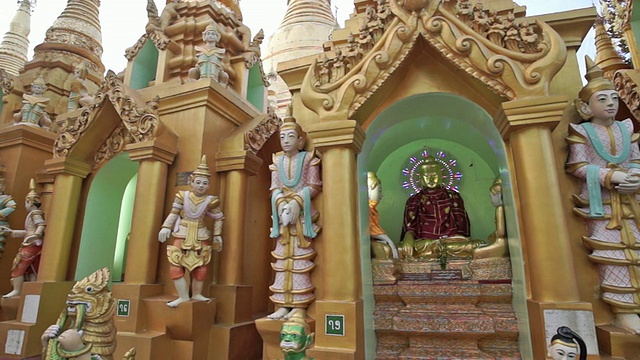 缅甸仰光大金寺五颜六色的宗教雕像视频素材