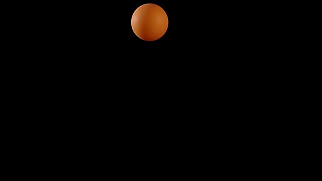 橙色的乒乓球用慢动作弹跳视频素材