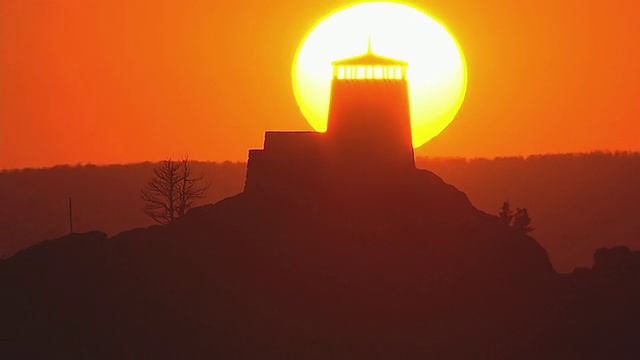 美国南达科他州，夕阳下，哈尼峰火塔的轮廓视频下载