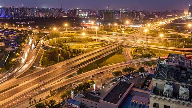 时间推移-北京路交叉口鸟瞰图，白天到夜晚的过渡(WS平移)视频素材