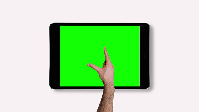 触摸屏平板电脑手势与绿色屏幕。视频下载