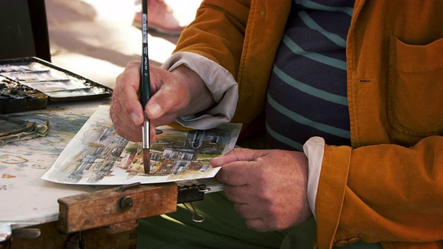 艺术家用水彩画在威尼斯的场景。视频下载