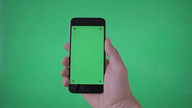 手持智能手机(肖像)在绿色屏幕BG视频下载