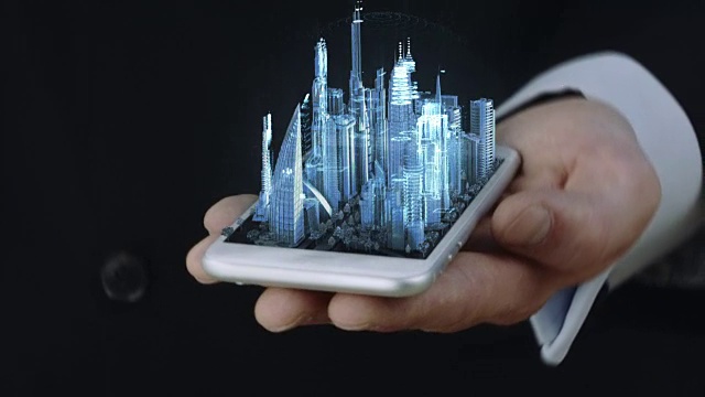 商人拿着电话与蓝色透明3D城市全息图视频素材