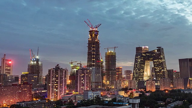 T/L MS HA PAN北京CBD和建筑工地(日夜匹配)视频素材