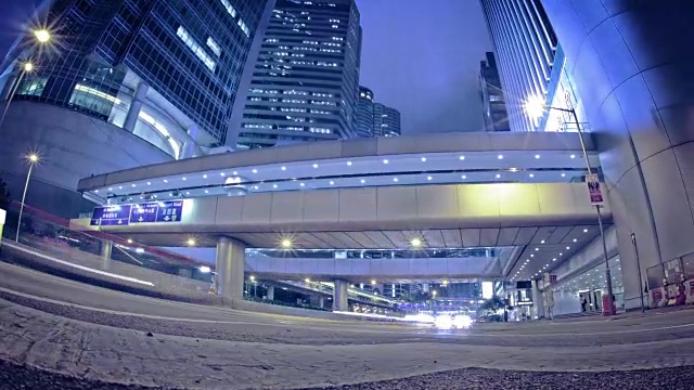 在中环的香港城市街道上的人们和交通的时间推移视图。视频下载