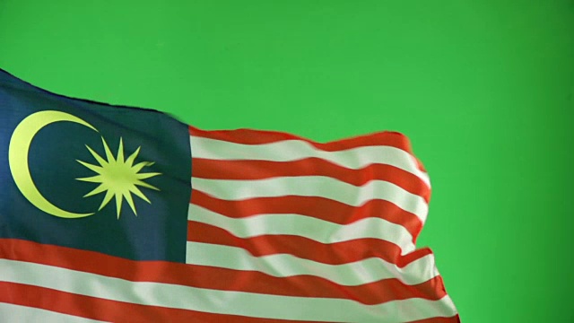 绿色屏幕上的马来西亚国旗，真实视频，而不是CGI -超级慢动作(马来西亚)视频下载