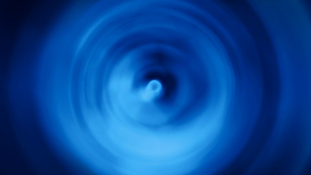 漩涡背景在蓝色，可循环视频素材