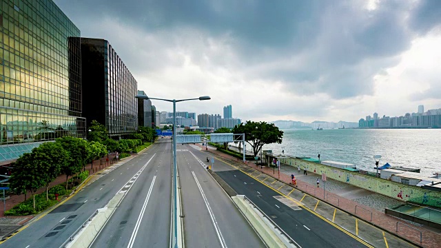 4K时间流逝:香港城市的高层摩天大楼。现代城市商务区背景视频素材