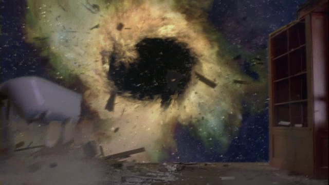 外太空的一个黑洞正在吞噬着受损房屋的碎片。视频下载