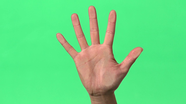 绿色屏风-女人的右手压在玻璃上。视频素材