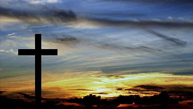 单十字架，背景为日落或日出。视频下载
