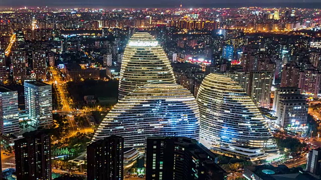T/L MS HA PAN Illuminated skyscraper，望京Soho at Night /北京，中国视频素材