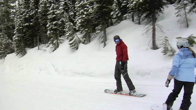 MS，男人和女人单板滑雪，白鱼，蒙大拿，美国视频素材