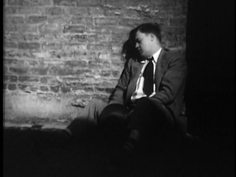 1949年，蒙太奇蒙太奇人靠在墙上，美国，音频视频素材