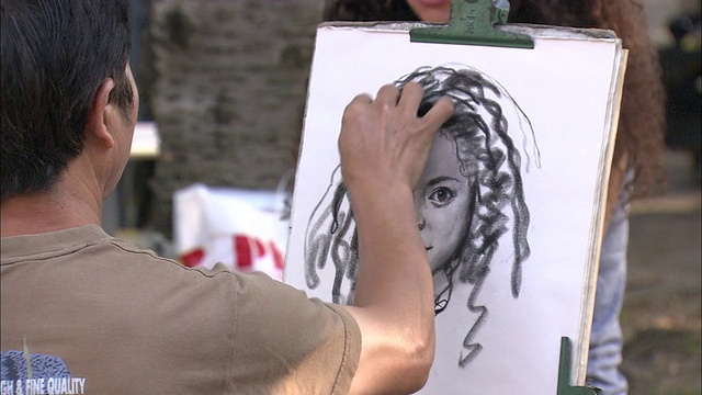 美国纽约，炮台公园，游客们在画肖像视频下载