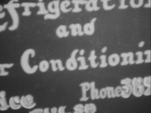 20世纪40年代/ 50年代蒙太奇B/W MS女人在办公室接听电话/ MS男人接听电话/男人用喷灯修理设备/“爱德华制冷和空调服务”的签名/格林伍德，塔尔萨，俄克拉荷马州，美国视频素材