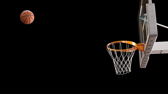 美丽的职业篮球投篮慢动作。球在黑色背景下飞入篮筐。运动概念。3d动画4k超高清3840x2160。视频素材