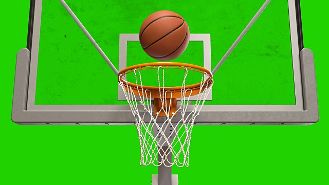 前视图投篮球篮的慢动作特写。漂亮的球在篮网中旋转，黑色的背景和绿色的屏幕。运动概念。3d动画Alpha Matte 4k UHD 3840x2160。视频素材