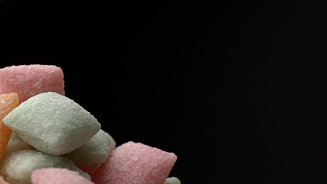 甜糖果垫混合零食糖旋转背景视频素材