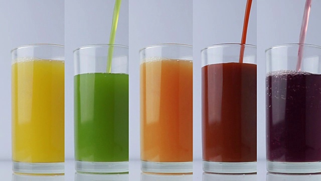 新鲜蔬菜和果汁在玻璃杯中饮用健康视频素材