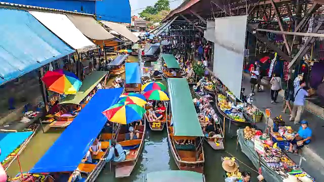4K，泰国Damnoen Saduak水上市场的时光流逝游客视频素材