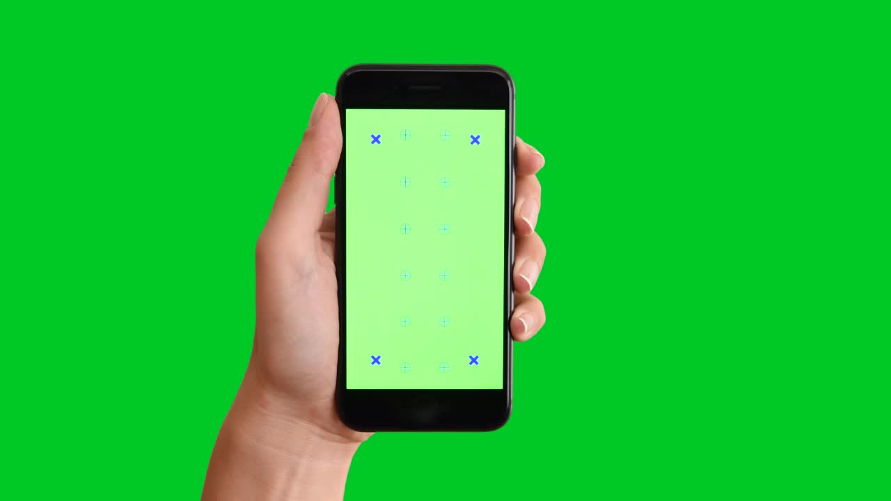 使用智能手机在绿色屏幕上显示色度键视频素材