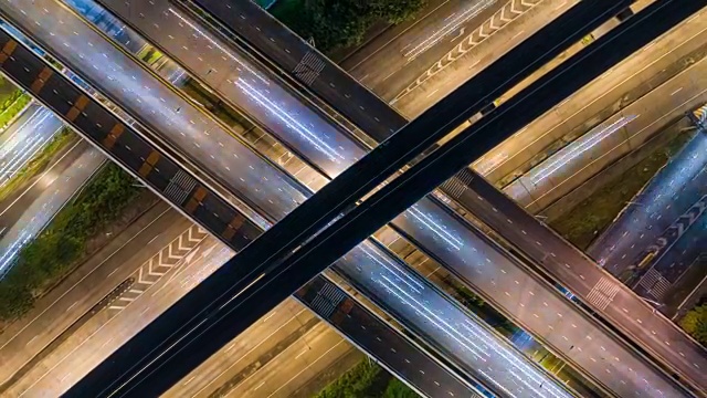 4K时间推移或超推移缩小:鸟瞰图网络或公路交叉口的交通或分销的概念背景。视频素材