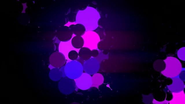 黑色背景上的彩色发光球。数字动画3d渲染。4K，超高清分辨率视频素材