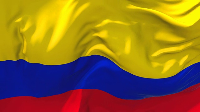 哥伦比亚国旗迎风飘扬的慢动作动画。4K逼真的织物纹理旗帜平稳吹在一个刮风的日子连续无缝循环背景。视频下载