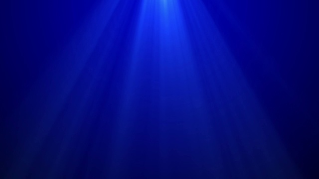 音量灯照射在蓝色背景上，用于拷贝空间视频素材