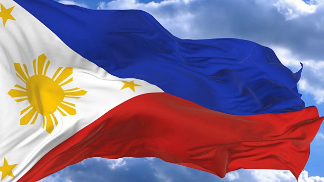 在菲律宾蔚蓝的天空中挥舞着国旗视频下载