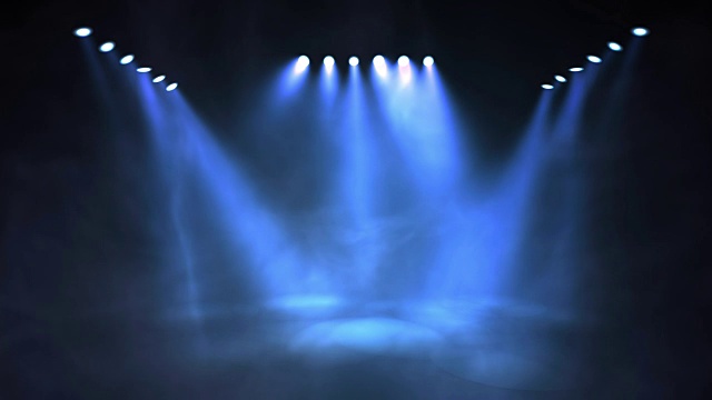 舞台灯光在演播室闪耀。无缝循环动画。视频素材