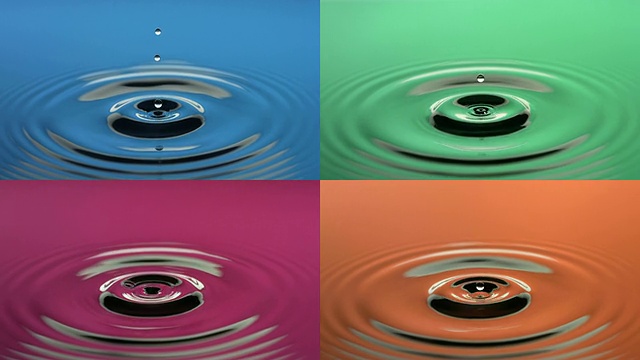 四颗反射不同颜色的水滴视频素材